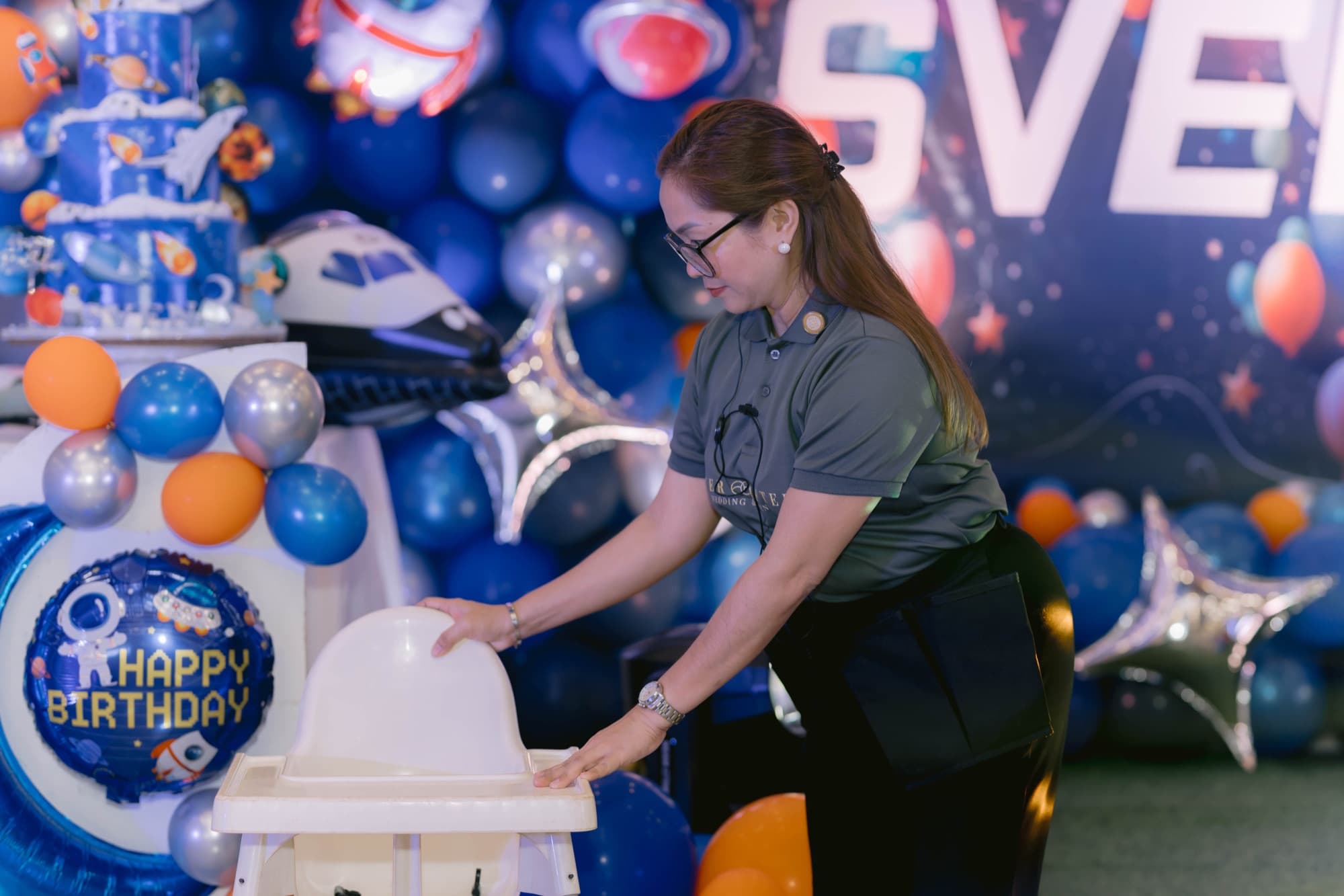 A coordinator making final checks before guests arrive