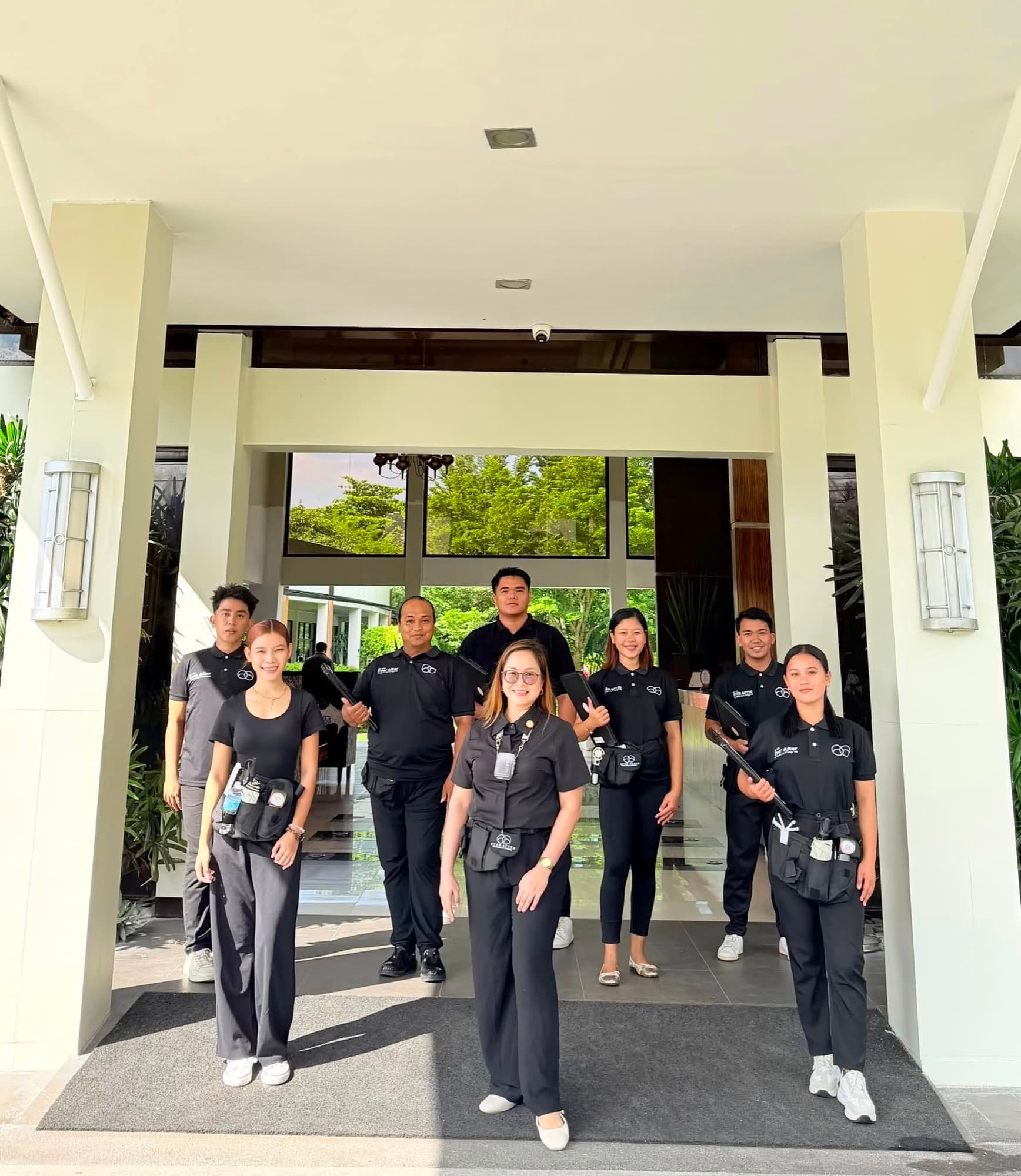 Sharon leading the Ever After team at a venue entrance