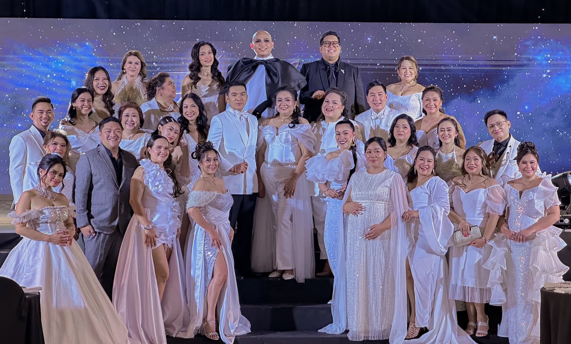 Members of the Philippine Association of Wedding Planners on stage at a gala evening