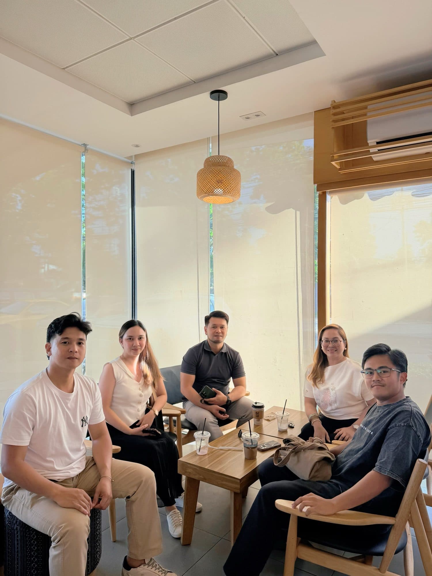 The Ever After team sitting together over coffee around a low table